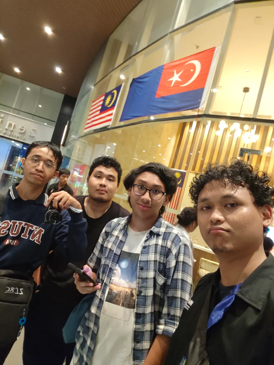 Zharif, Wildan, Rio, and me, from left to right, during a transit stop in Malaysia.